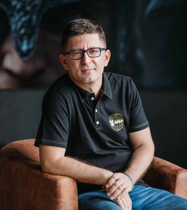 Oddin.gg Managing Director Marek Suchar sitting in an arm chair